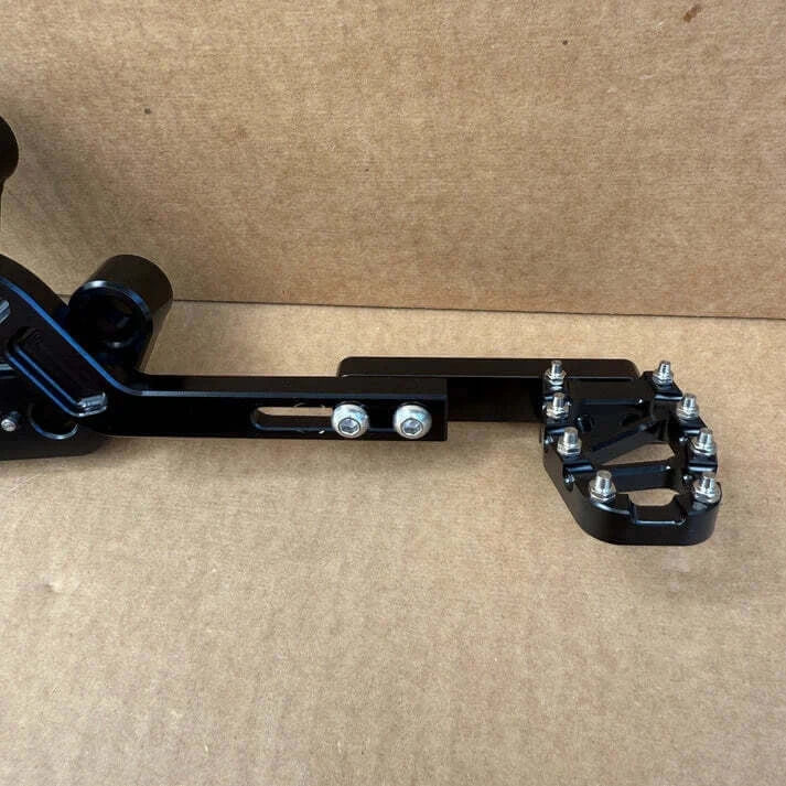 Foot brake extension for Surron Light Bee — hardware detail