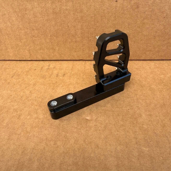 Foot brake extension for Surron Light Bee — detail view